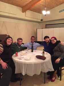 Gathering with new friends for a YAD Trivia Night.